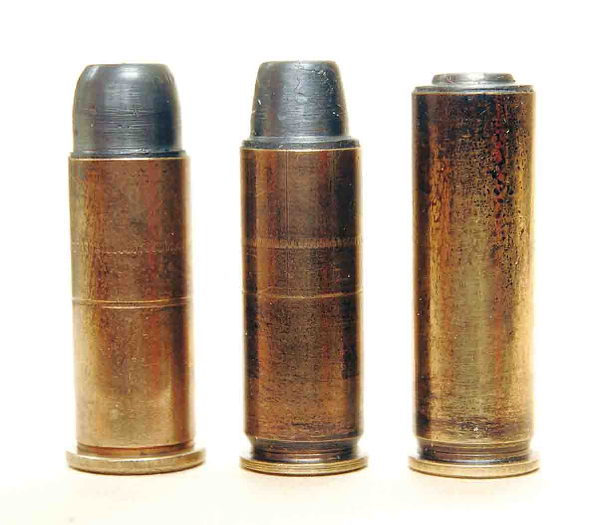 Modified .38 Special rounds, possibly from the U.S. Army Marksmanship Unit experiments. Left to right: a shortened rimmed case, a shortened semi-rimmed case and a full-length semi-rimmed case known as the .38 AMU.